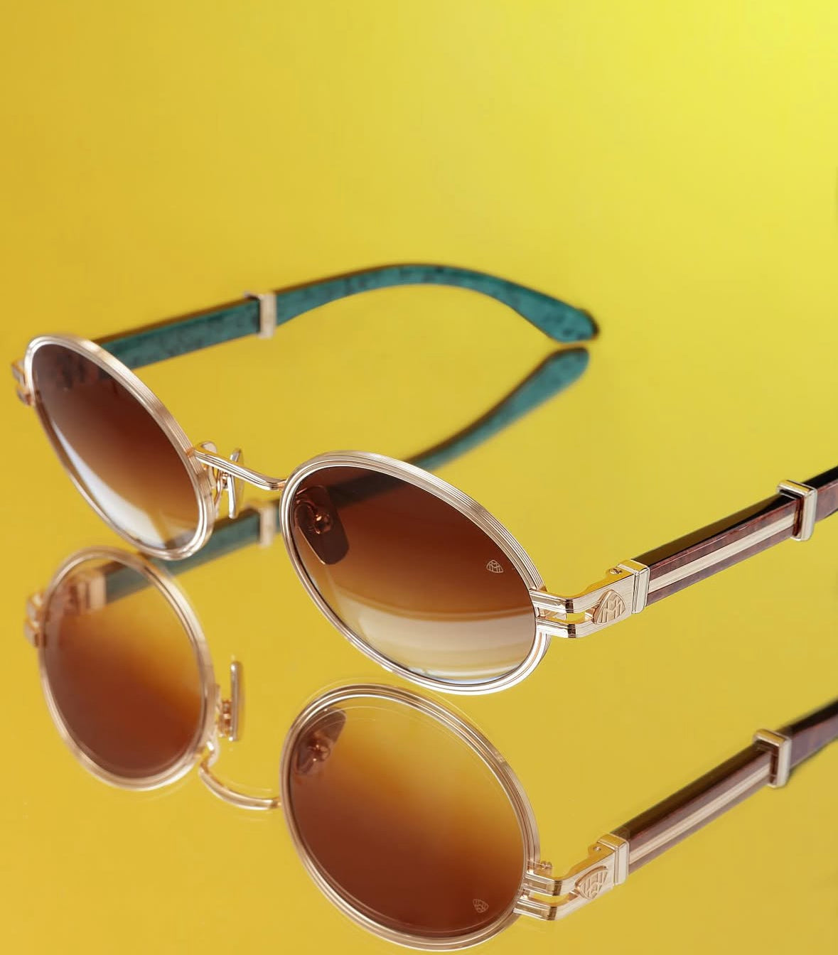Exclusive Maybach Sunglass the Producer in gold and wood.  Available only at I-Topian Optical Florida's Premiere Maybach Dealer. 
